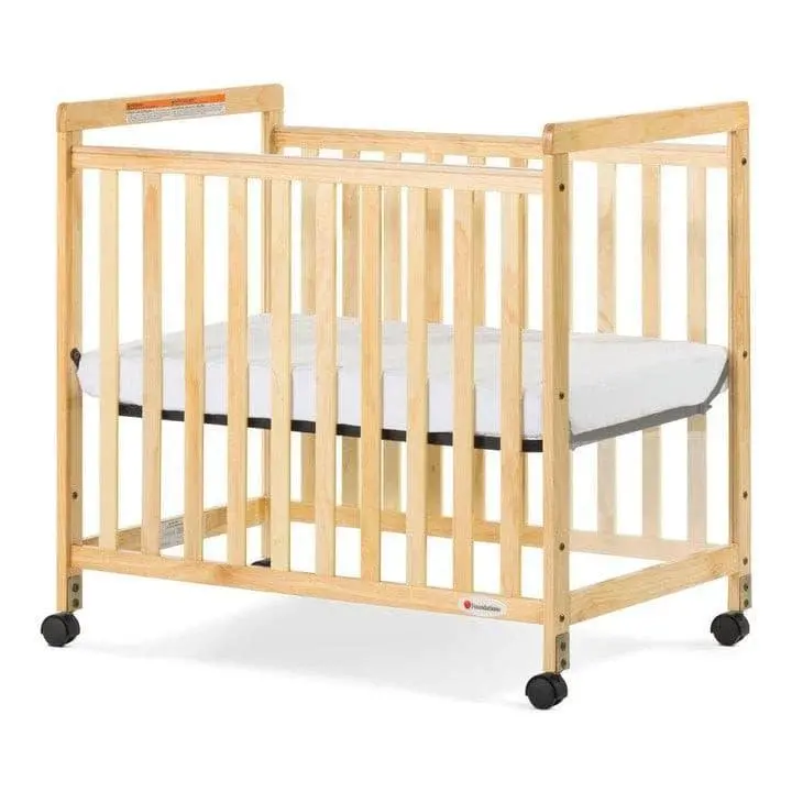 Foundations Safetycraft Compact Fixed-Side Baby Crib With Adjustable Mattress Board And Clearview Design 1