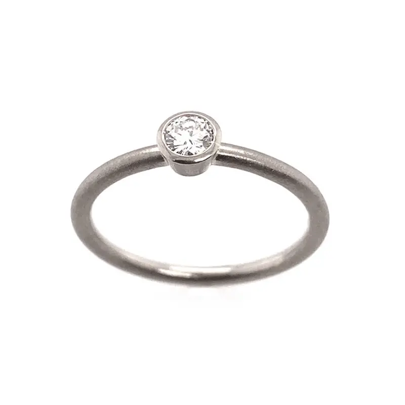 White Gold Solitaire Ring With Diamond Center Stone 1